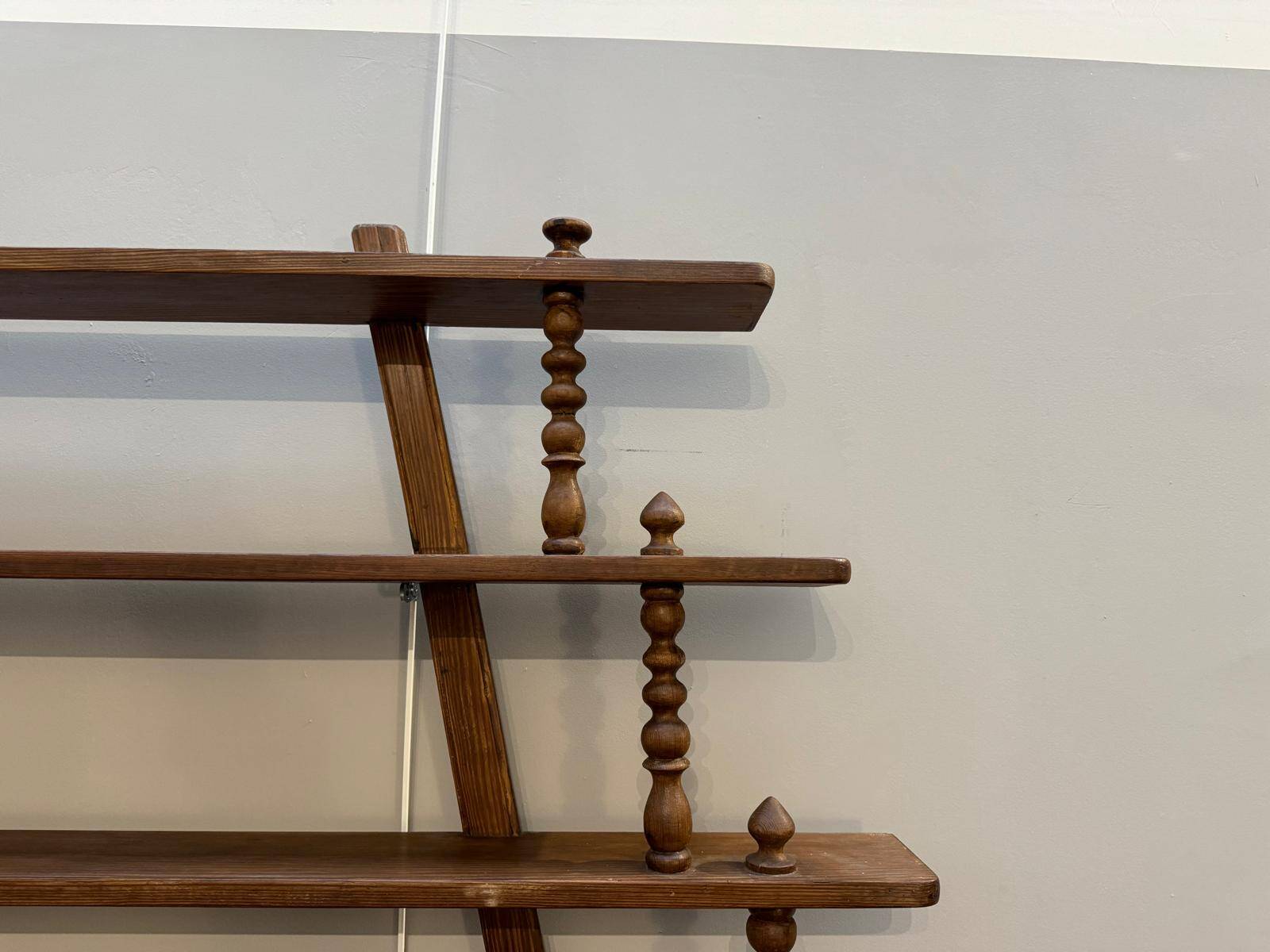 Turned wood bar wall shelf