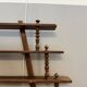 Turned wood bar wall shelf