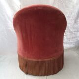 Pink velvet toad chair in the 1960s