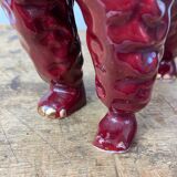 Burgundy and gold ceramic dog