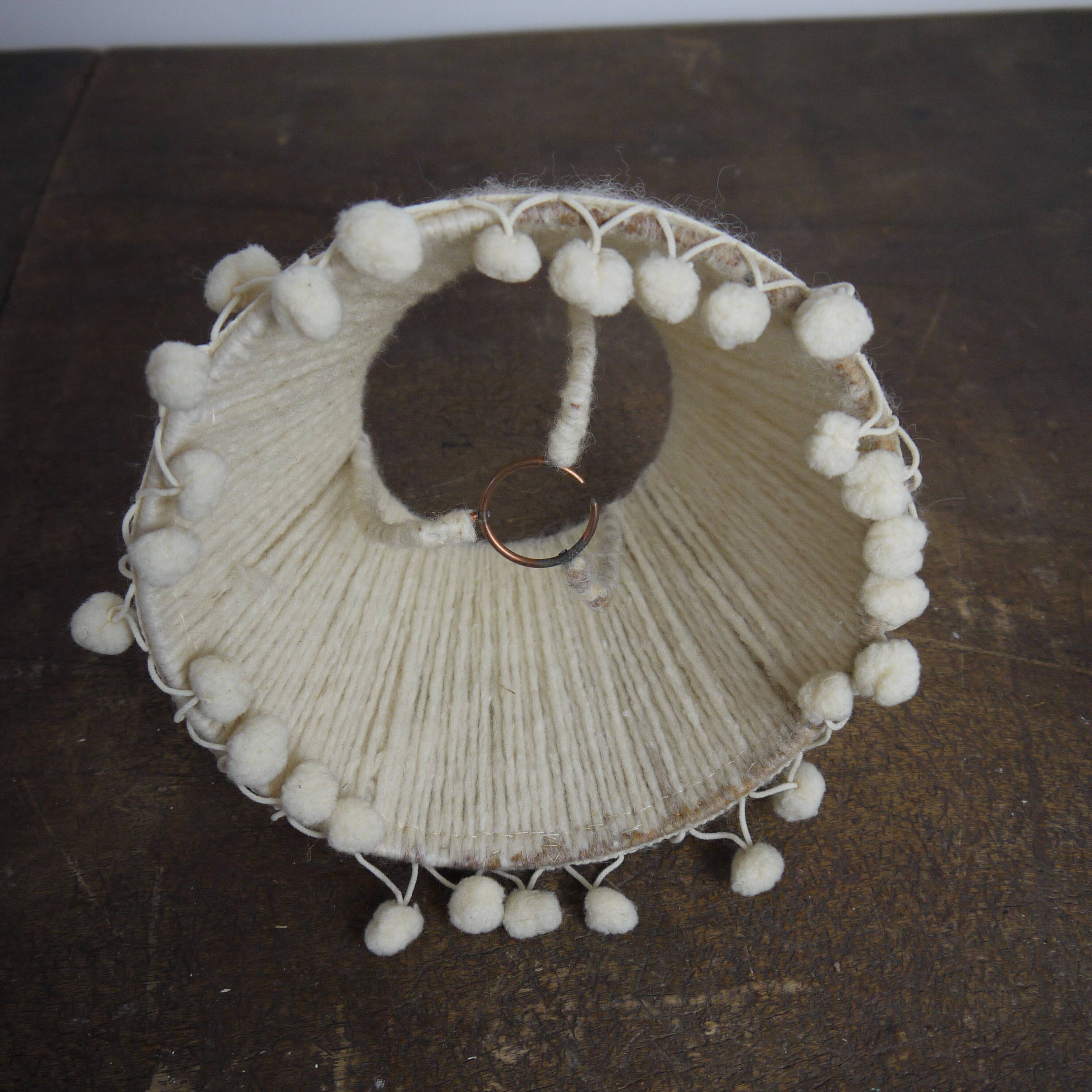 Wool lampshade with pom poms
