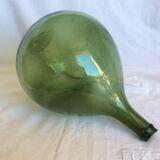 Former "lady jeanne" in blown glass, green bottle