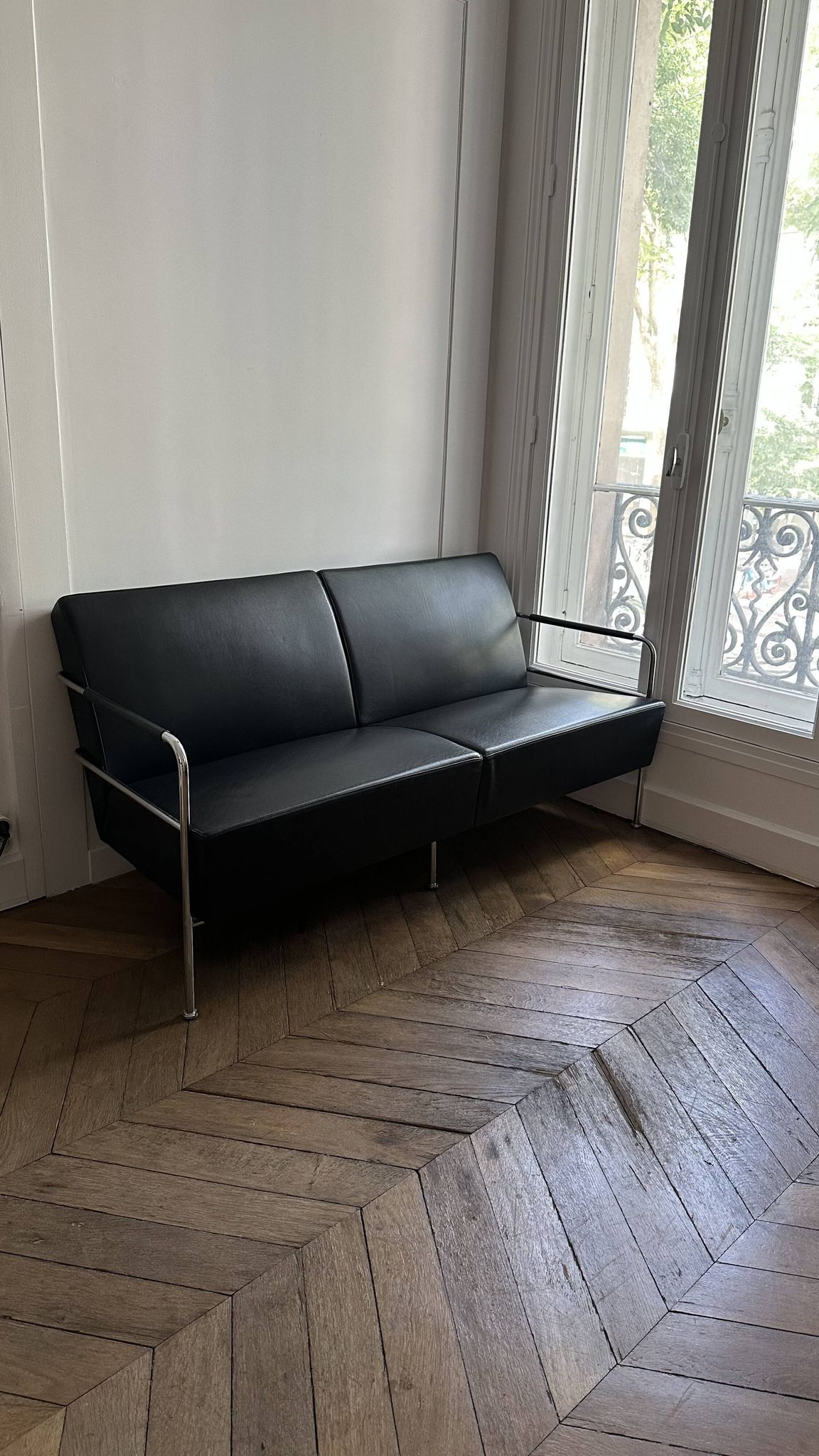 Sofa and armchair in Swedish black leather by Gunilla Allard for Lammhults.