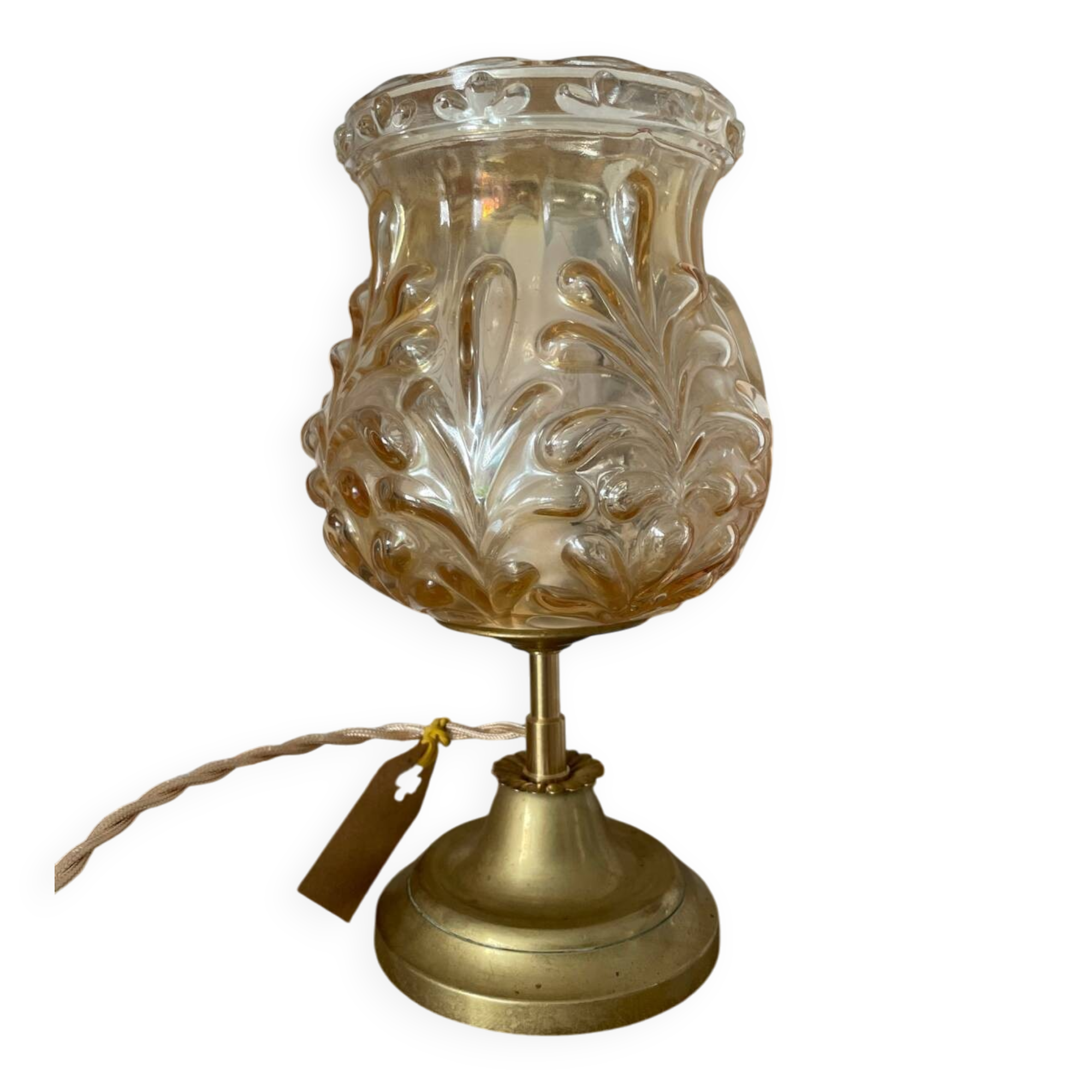 Table lamp with amber glass globe and brass base