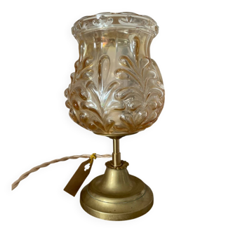 Table lamp with amber glass globe and brass base