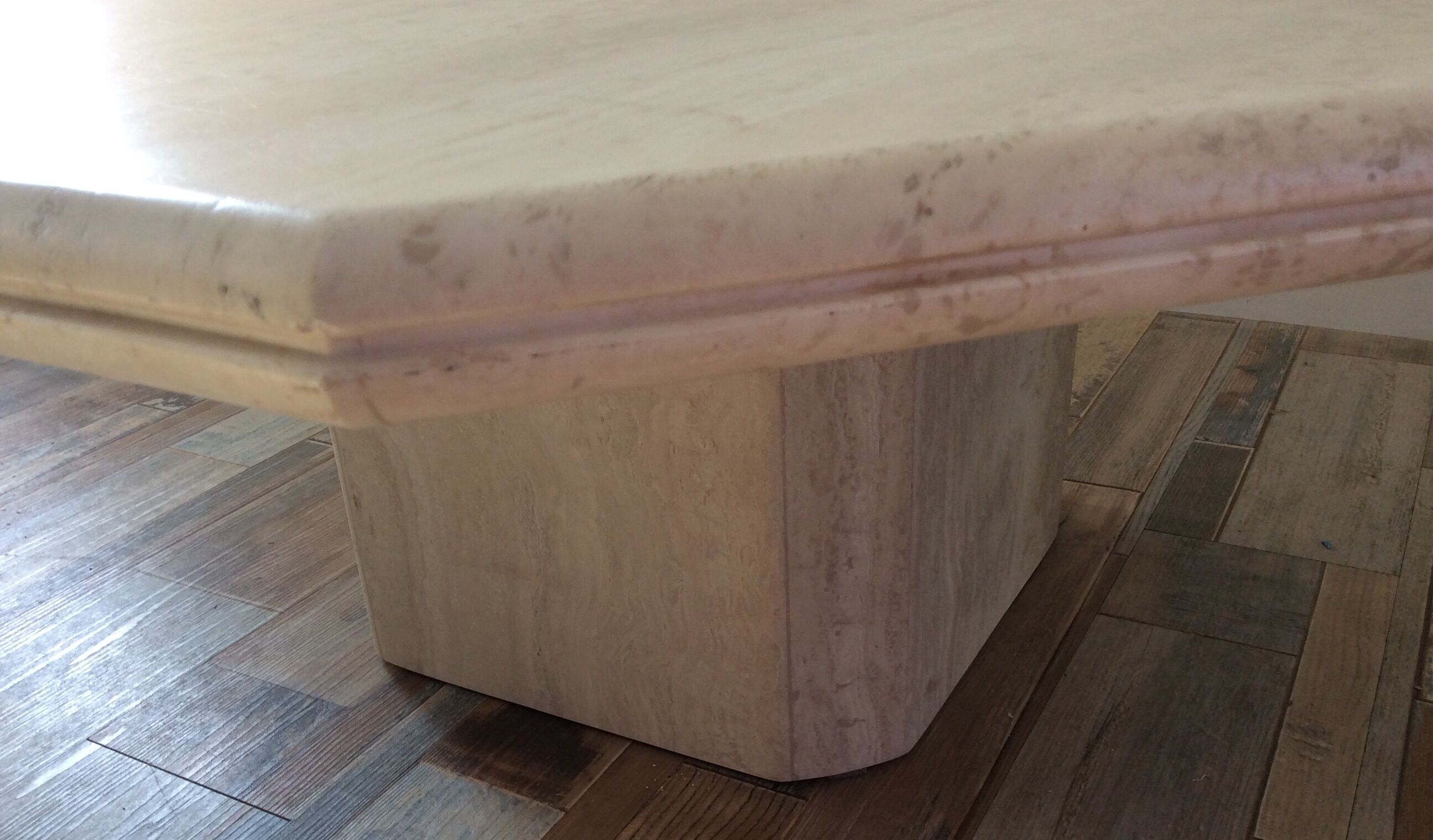 Octagonal coffee table in travertine