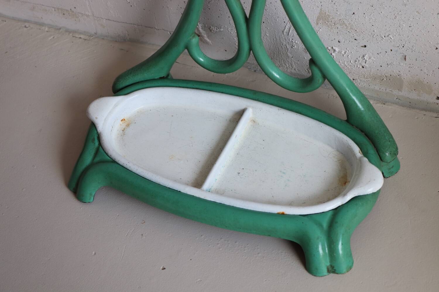 Old green cast iron umbrella stand