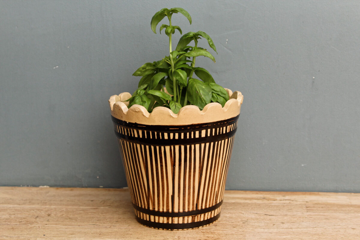 Vintage varnished sandstone pot cover