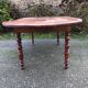 Antique cherry wood farmhouse table with rounded ends