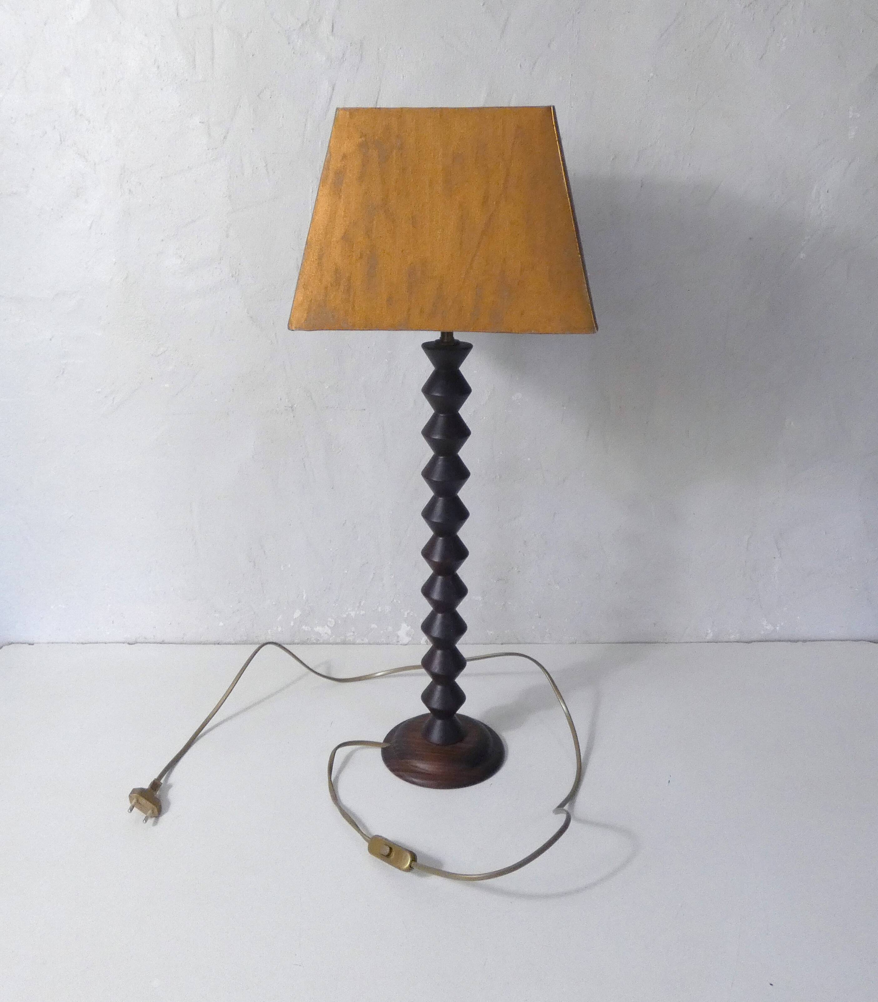 turned wooden lamp with spool base and vintage copper shade