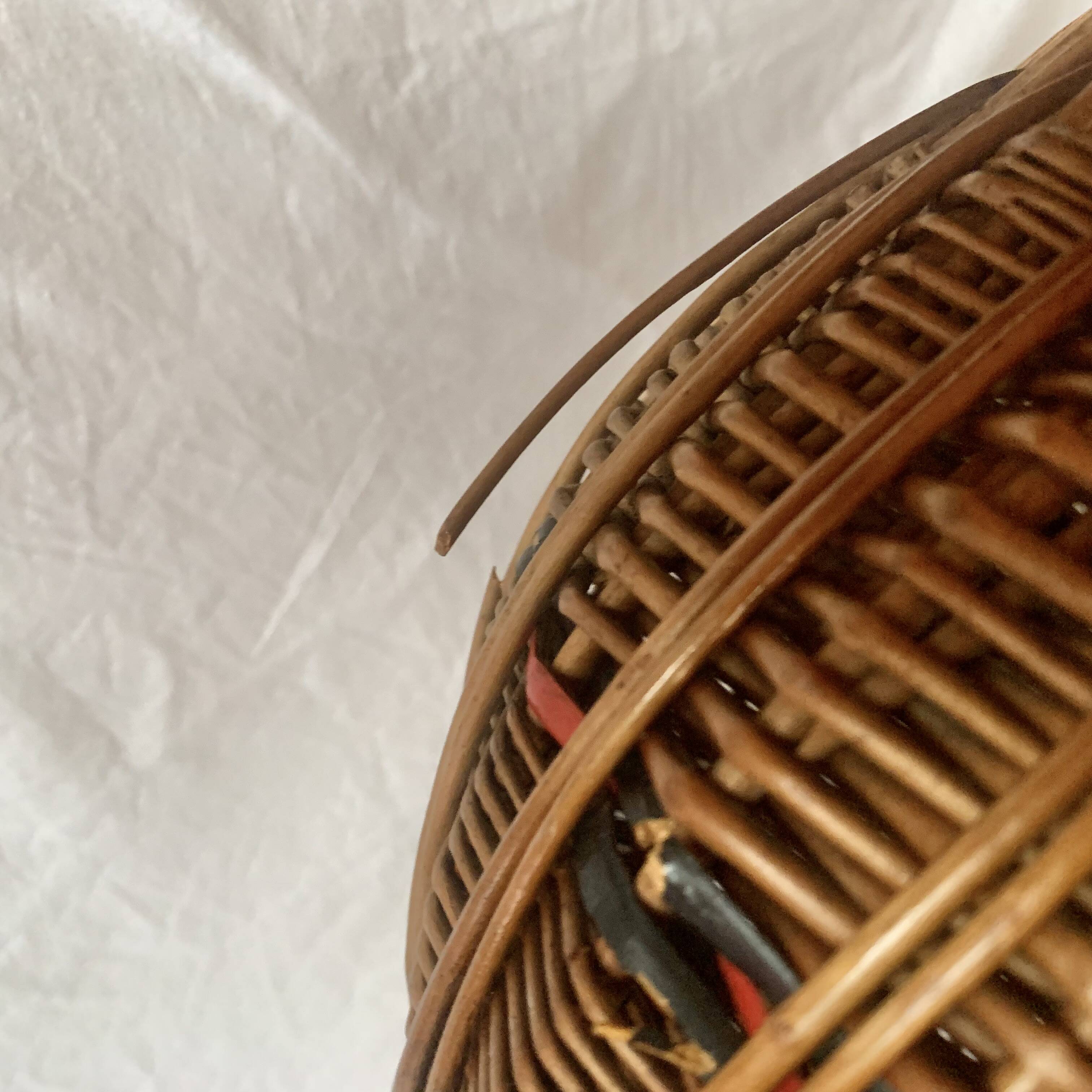 Old woven wicker basket and scoubidou