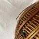 Old woven wicker basket and scoubidou