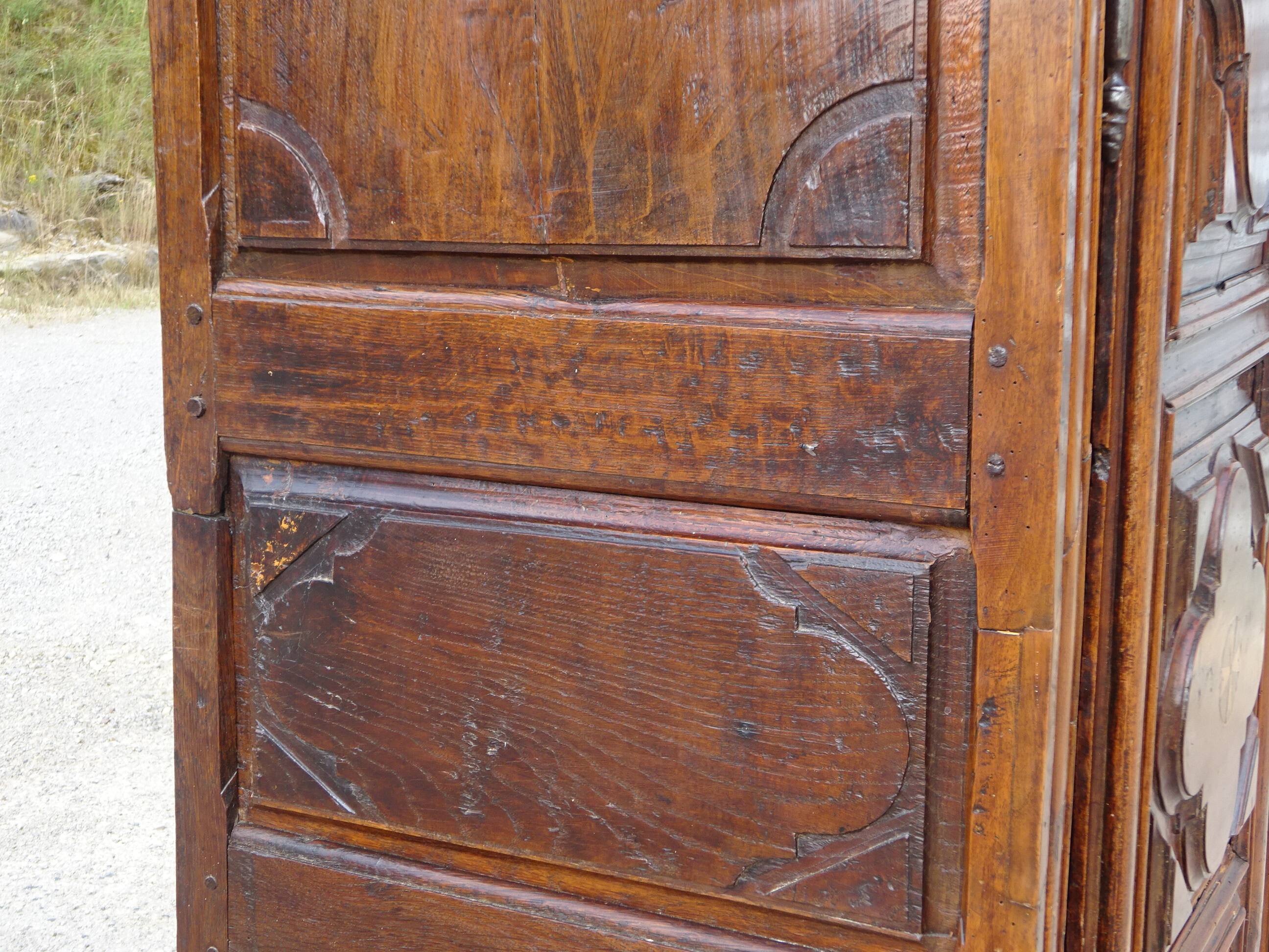 Antique Louis XIII wardrobe in solid walnut