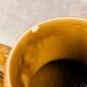 Vintage Sarreguemines pitcher with brown relief decoration.