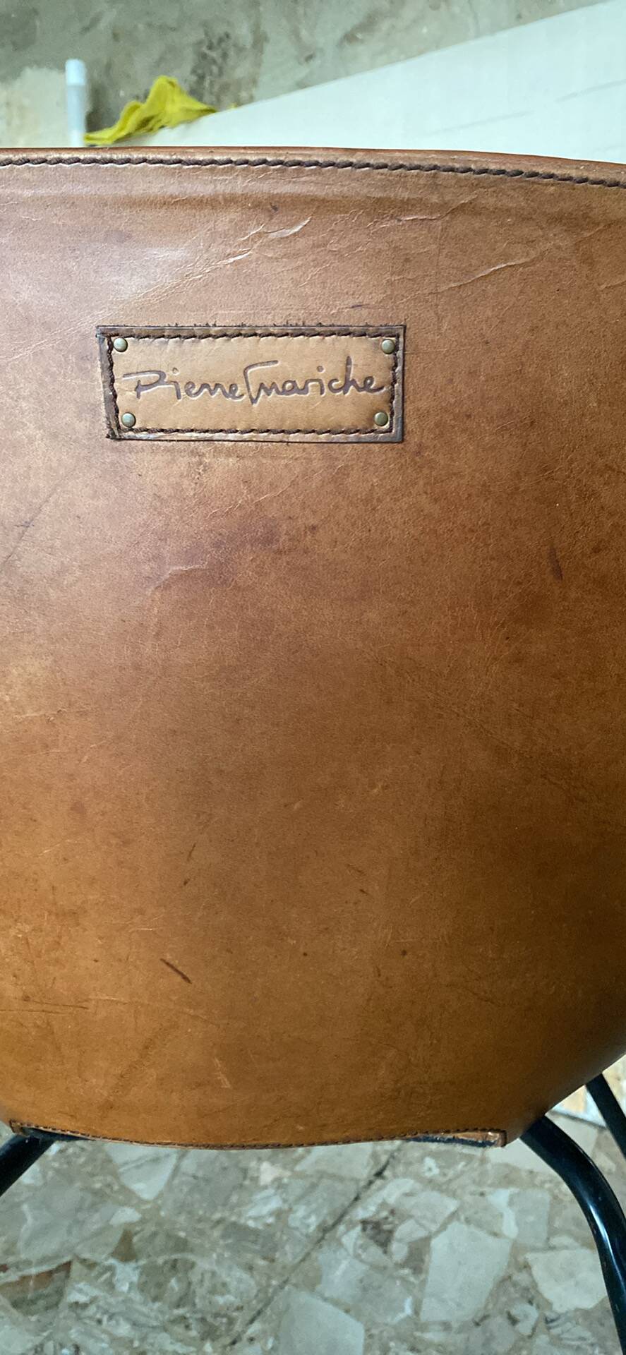 Leather chair by Pierre Guariche