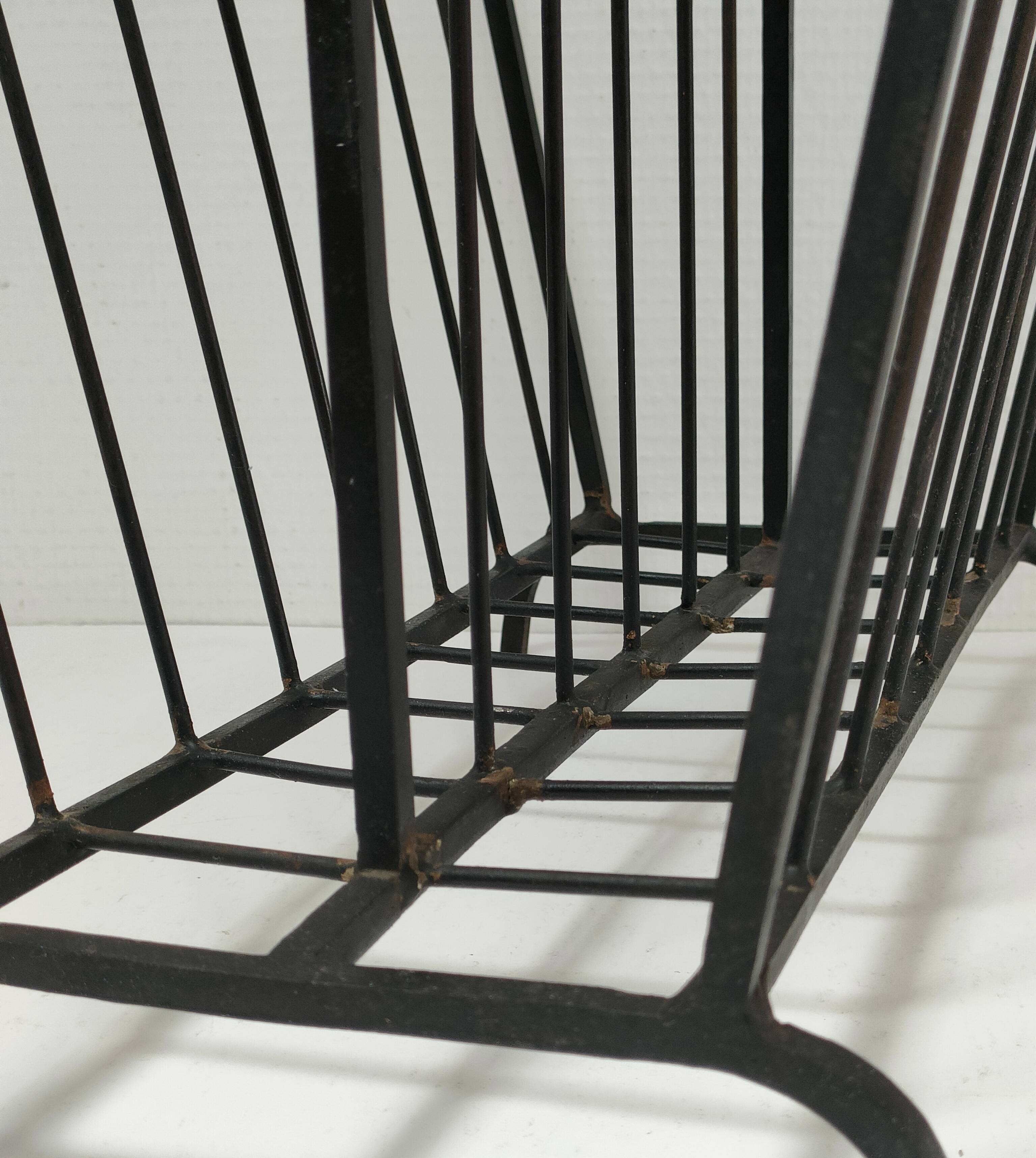 Modernist magazine holder black iron 60s