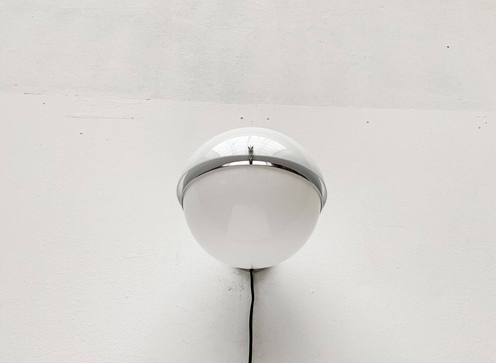 Mid-century Italian space age spherical wall light by Guzzini.