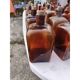 Set of 41 brown glass pharmacy bottles.