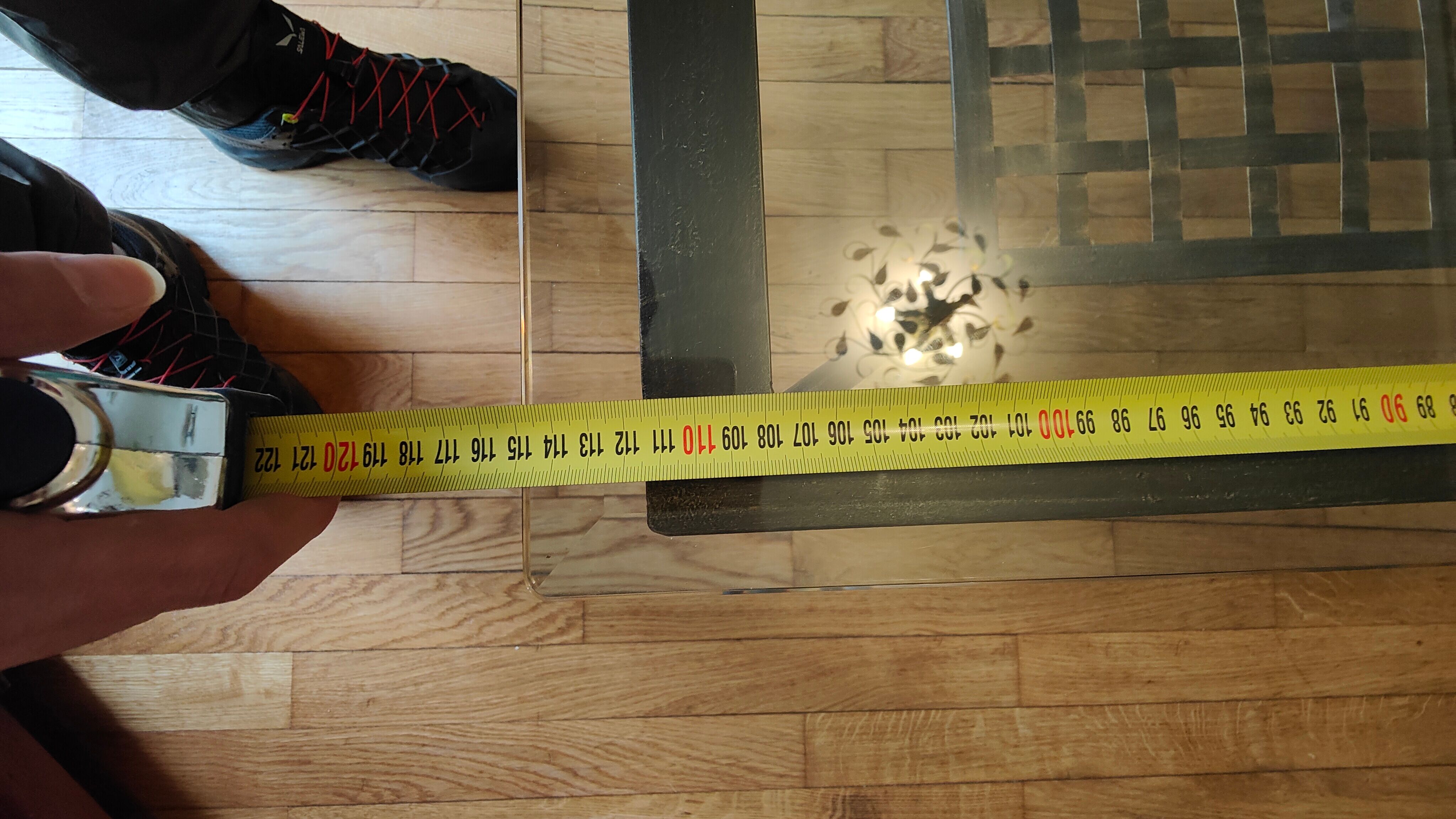 Black wrought iron coffee table and Roche Bobois glass top