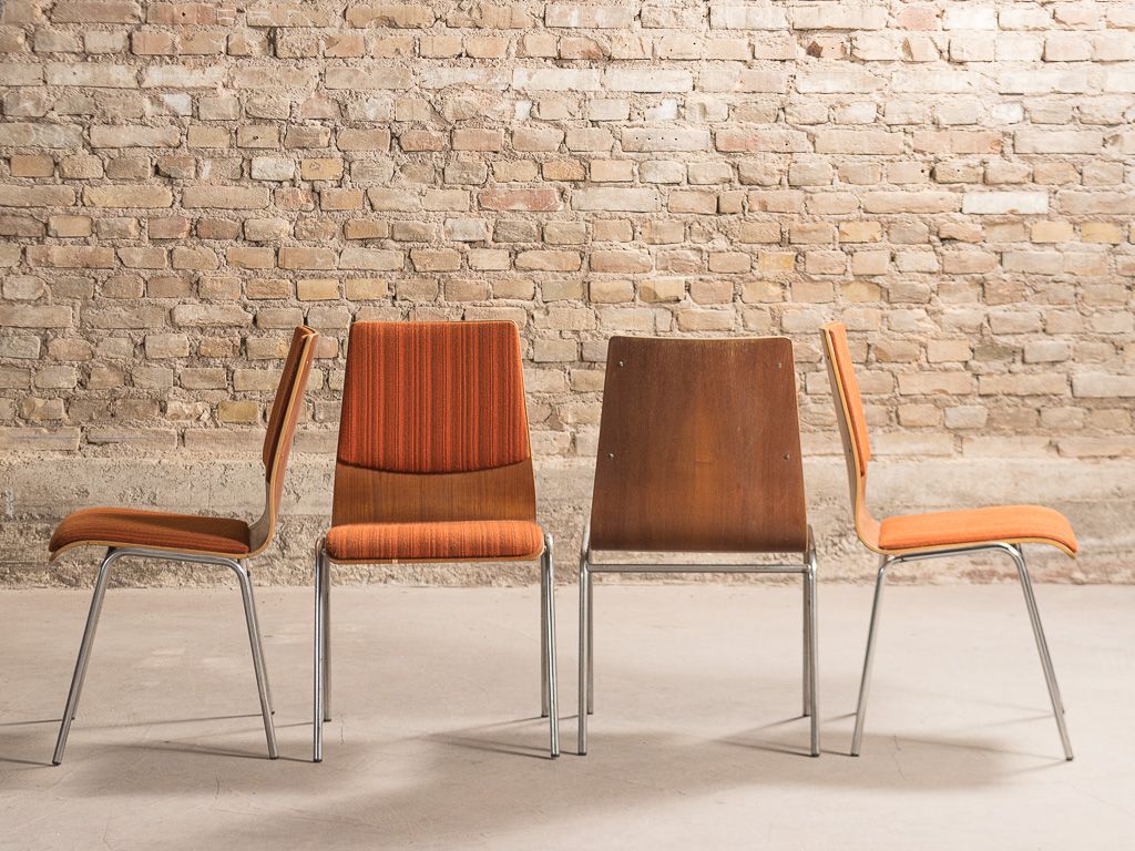 Set of 4 vintage chairs with a chrome steel base, teak backrest and seat