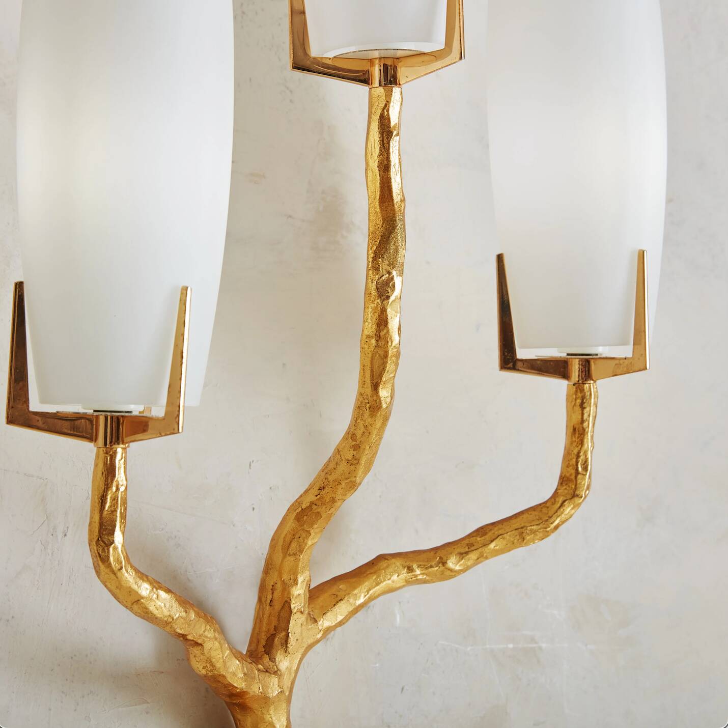 Pair of wall lights by Maison Arlus by Felix Agostini in bronze.