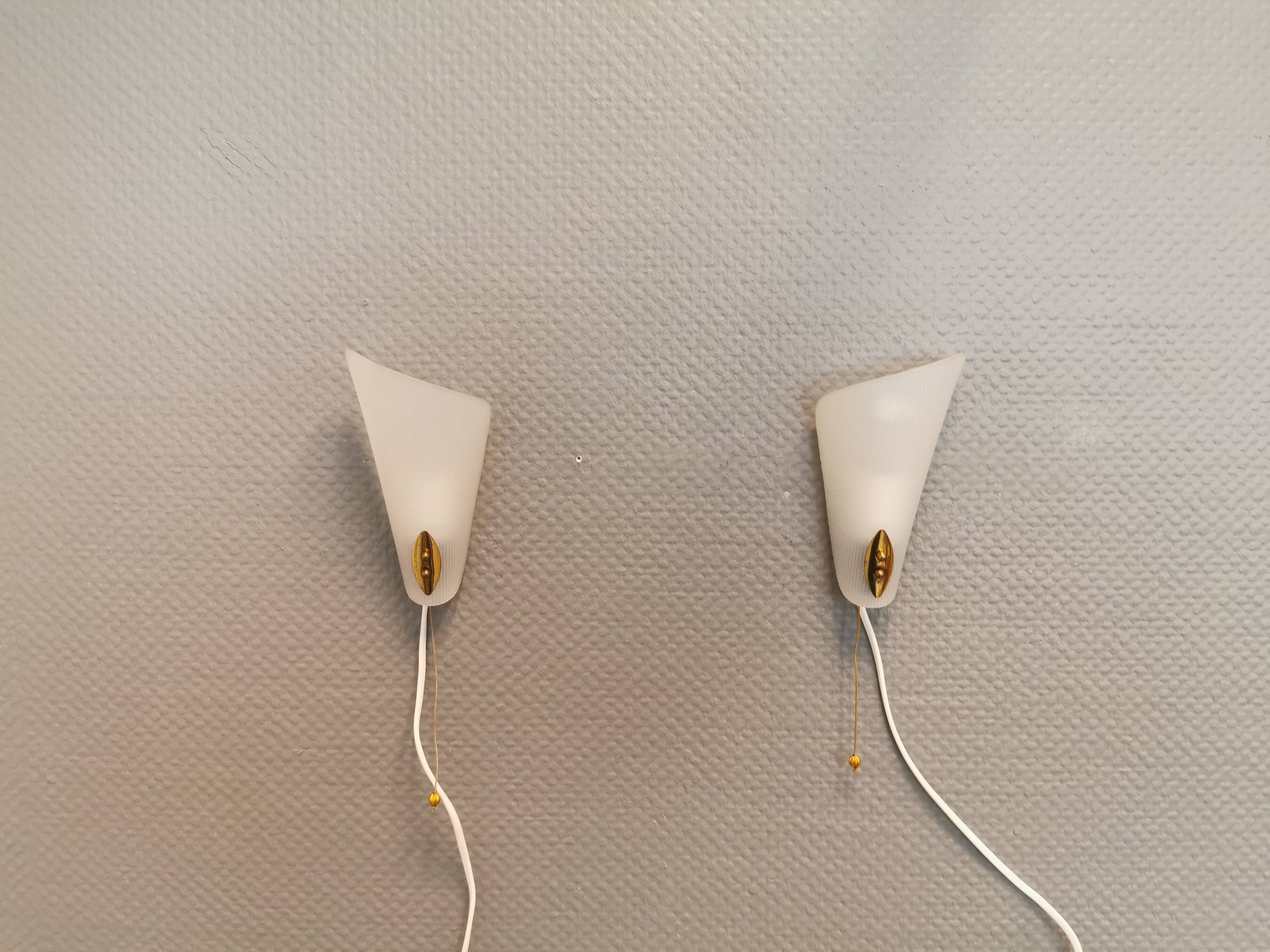 Two small Art Deco wall lights.