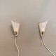 Two small Art Deco wall lights.