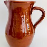 Vintage pitcher in glazed earth