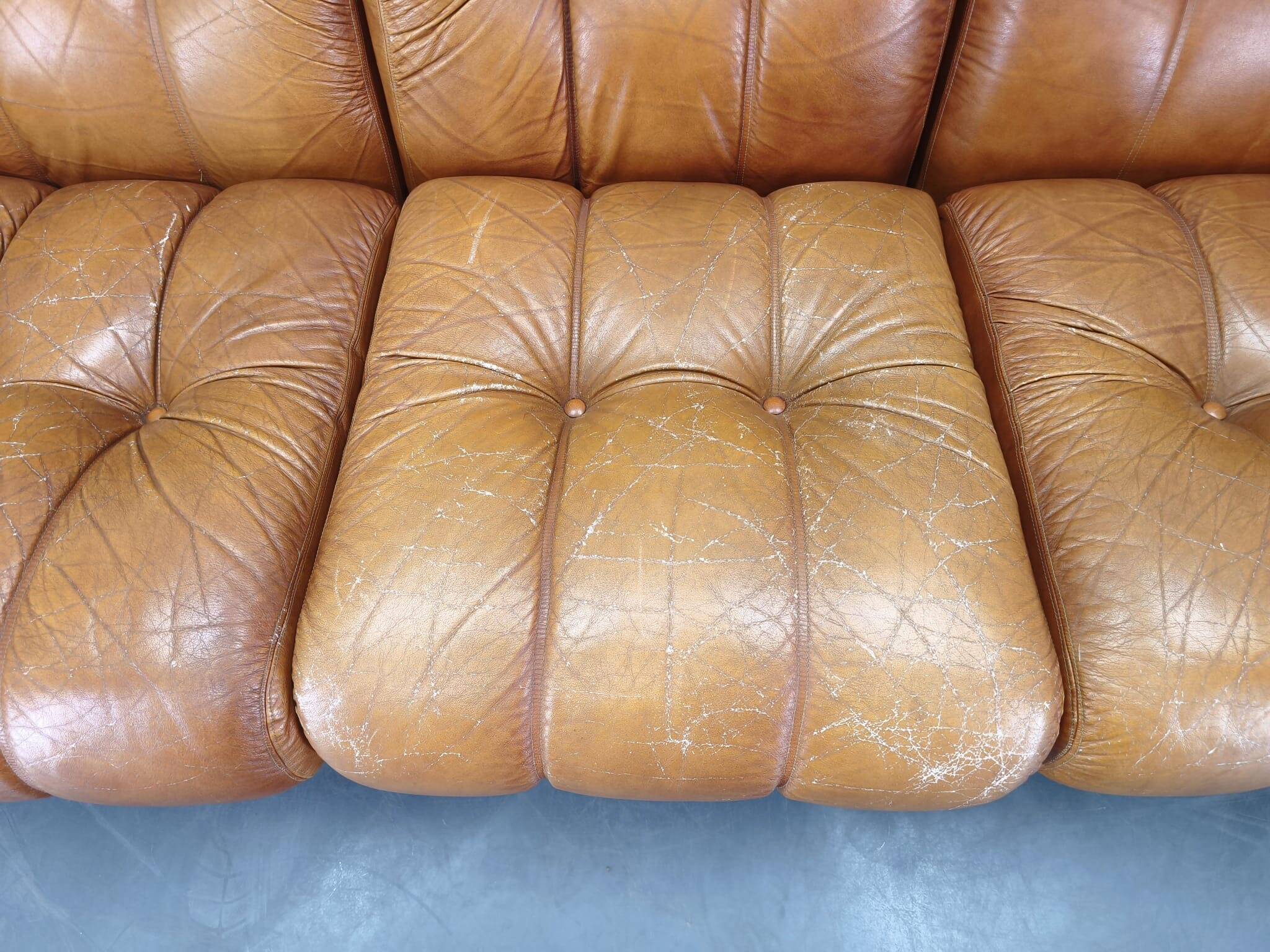 Three-seater sofa from the mid-century produced in Italy in the 1970s.