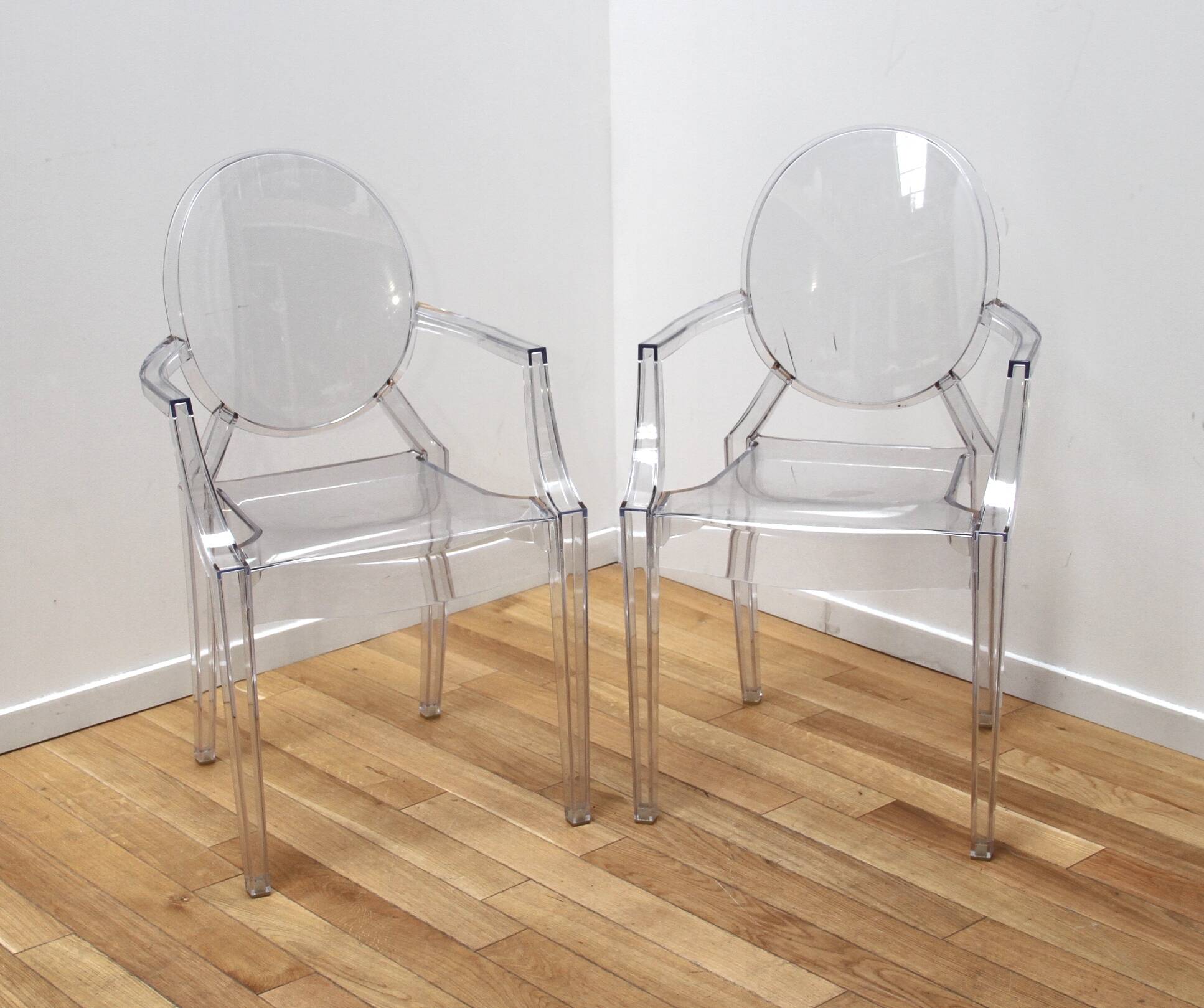 Pair of Louis Ghost chairs, Philippe Starck