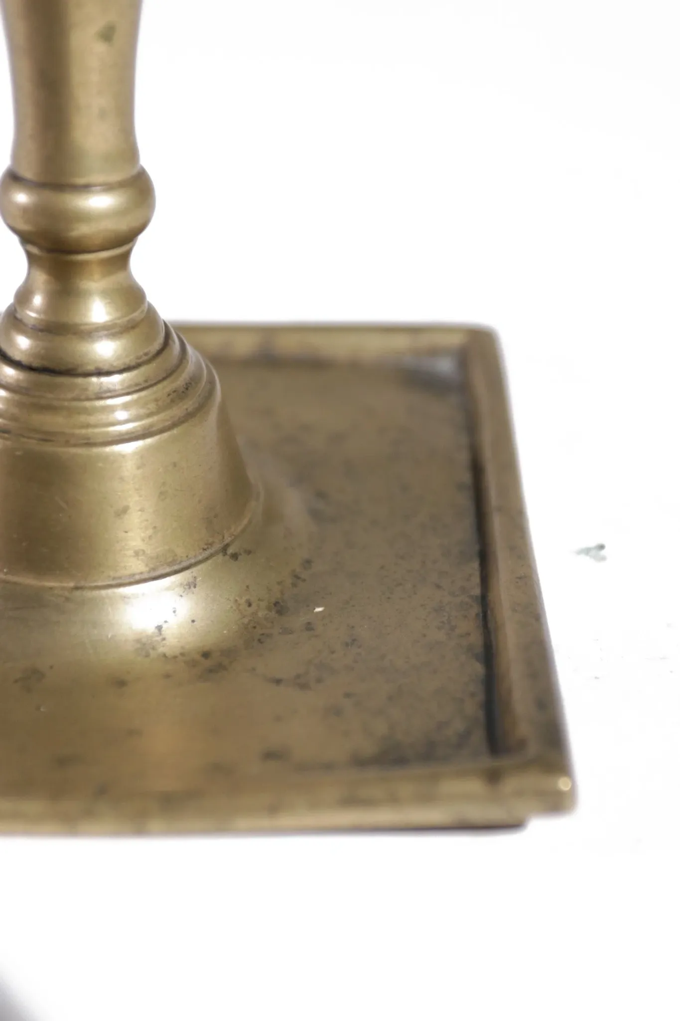 17th-century Spanish brass candlestick with square base