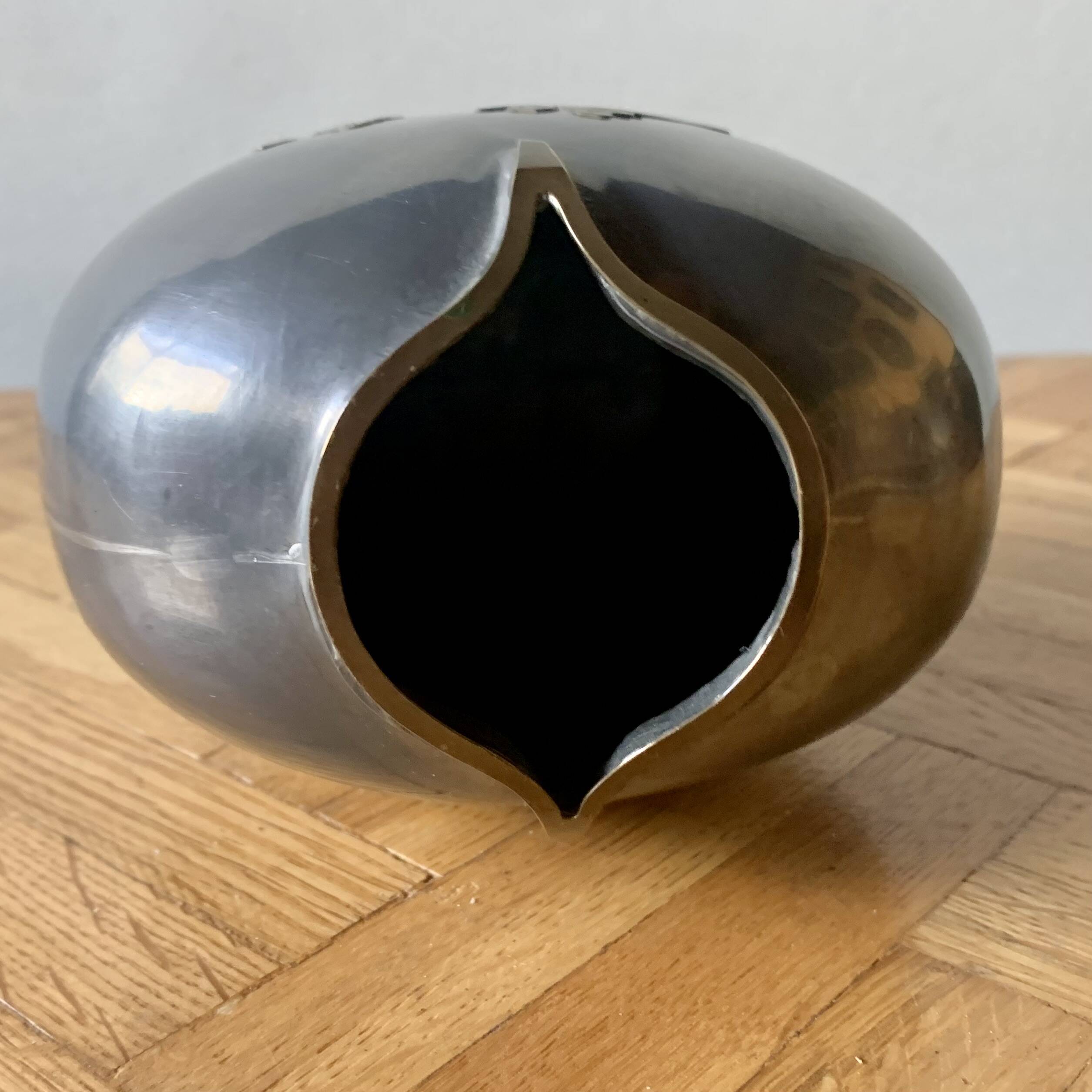 Small pewter vase decorated with brass flowers