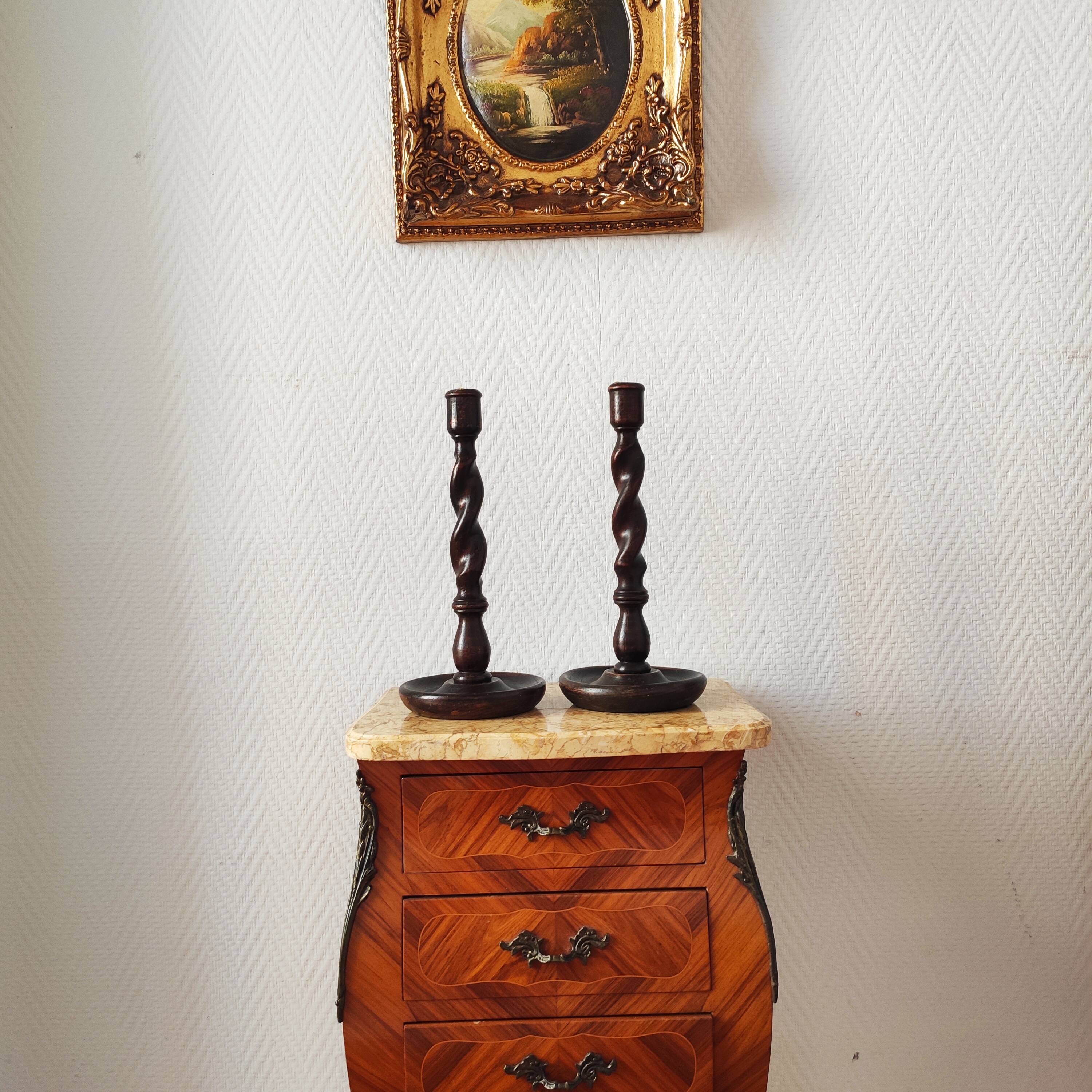Old pair of English turned wood candlesticks