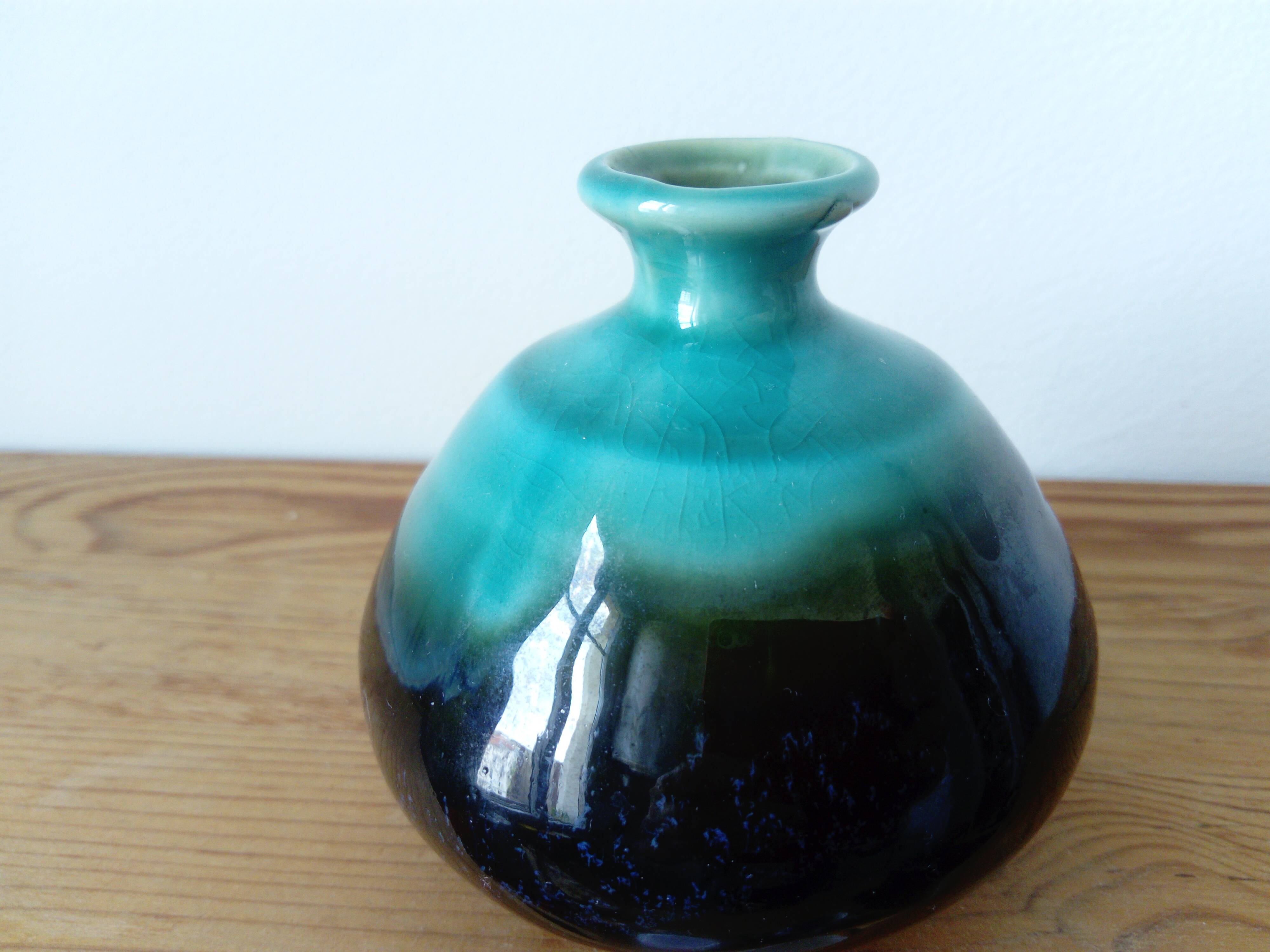 Small brown and turquoise ceramic vase