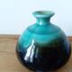 Small brown and turquoise ceramic vase