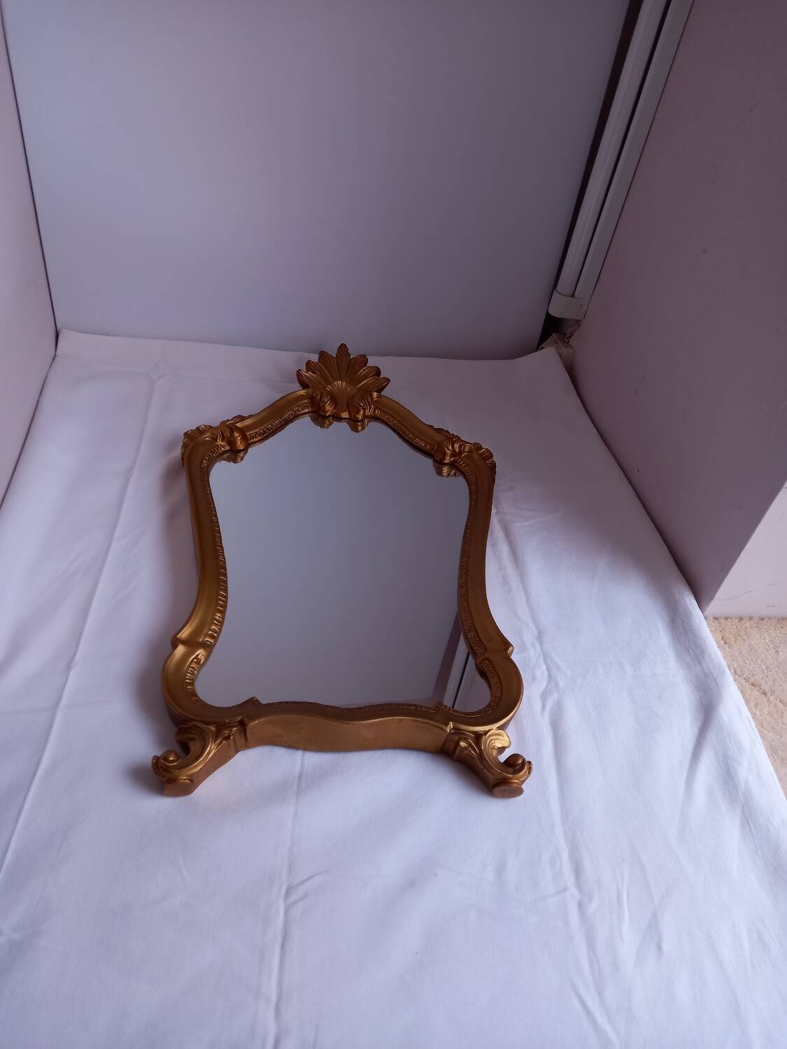 Antique gilded wooden mirror