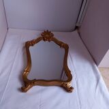Miroir ancien en bois doré
