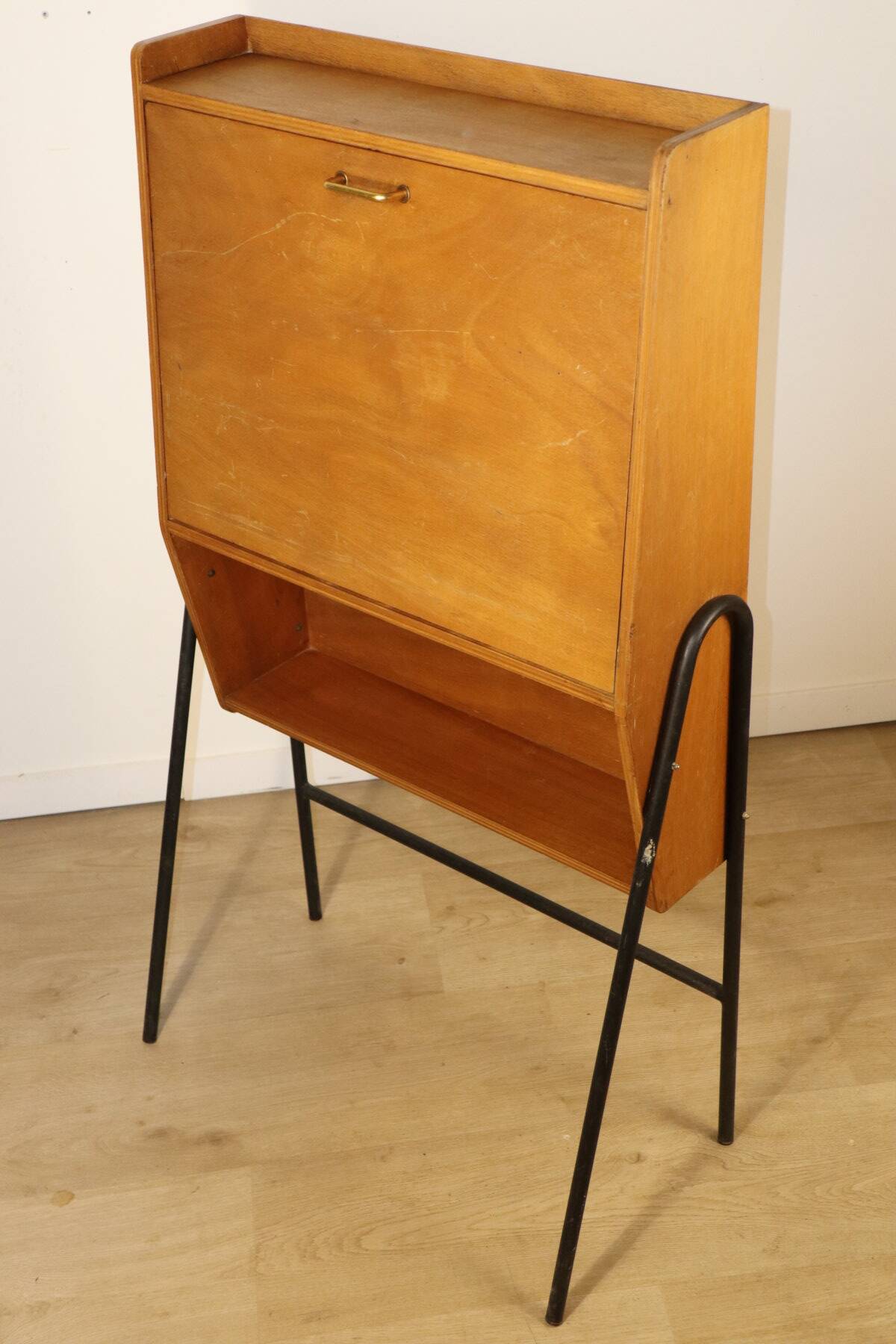 Vintage 1960s wooden secretary with metal legs.