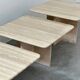 Set of three Italian travertine nesting / side tables, 1970s–1980s