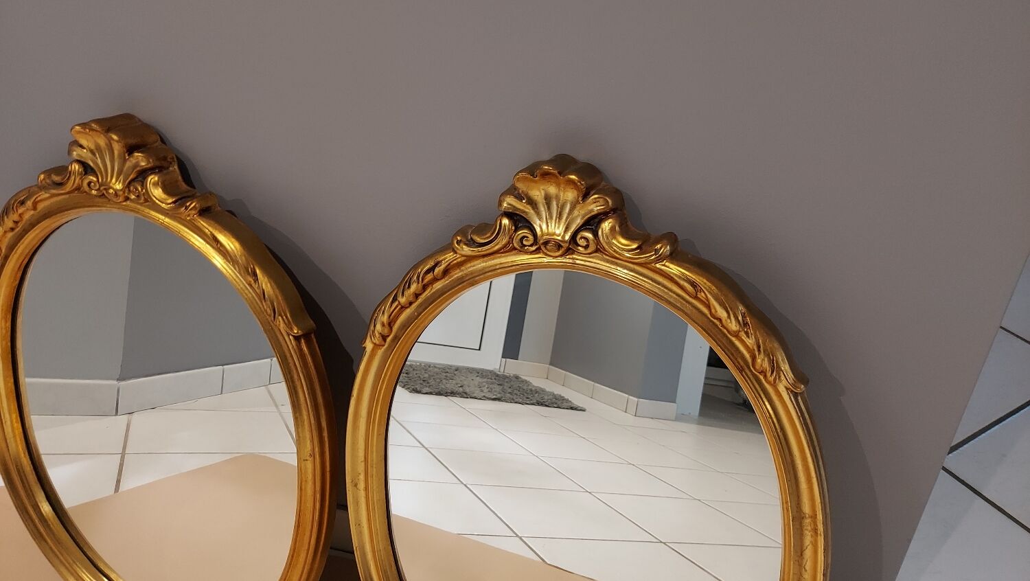 Paire de miroirs oval  doré vintage