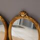 Paire de miroirs oval  doré vintage