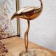 Golden brass heron