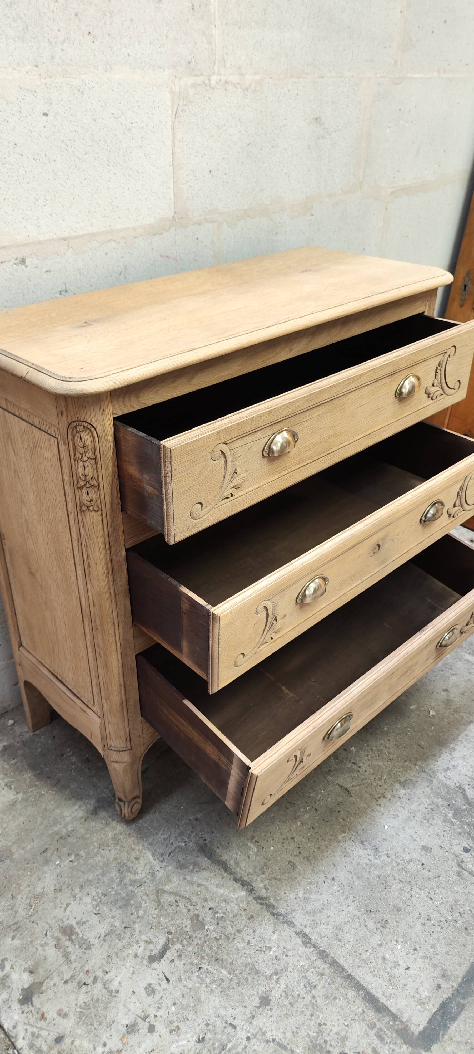 Old chest of drawers with three drawers in raw solid oak