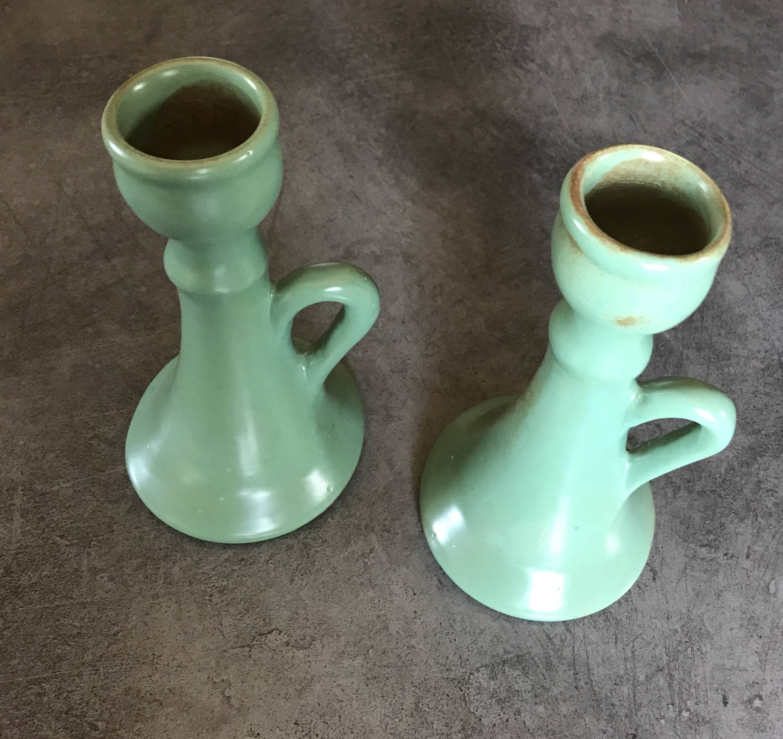 Pair of vintage table candle holders in green enameled ceramic