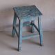 Blue patinated farm stool