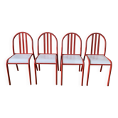 4 red metal chairs by Mallet-Stevens