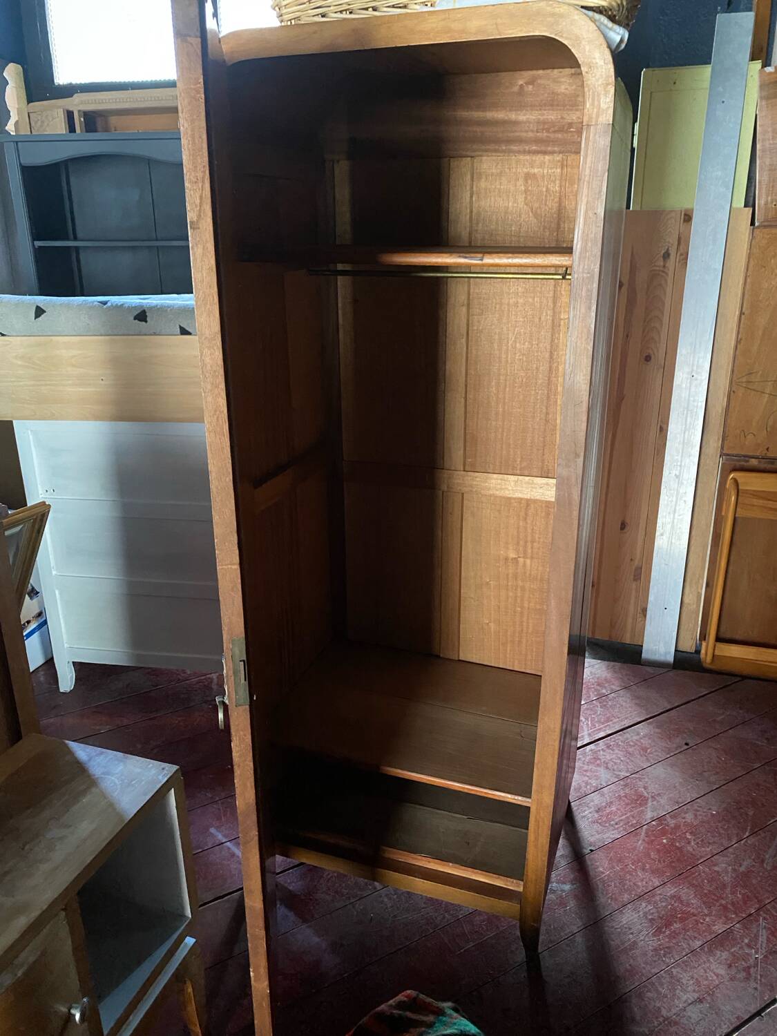 Pair of rounded mirrored wardrobes