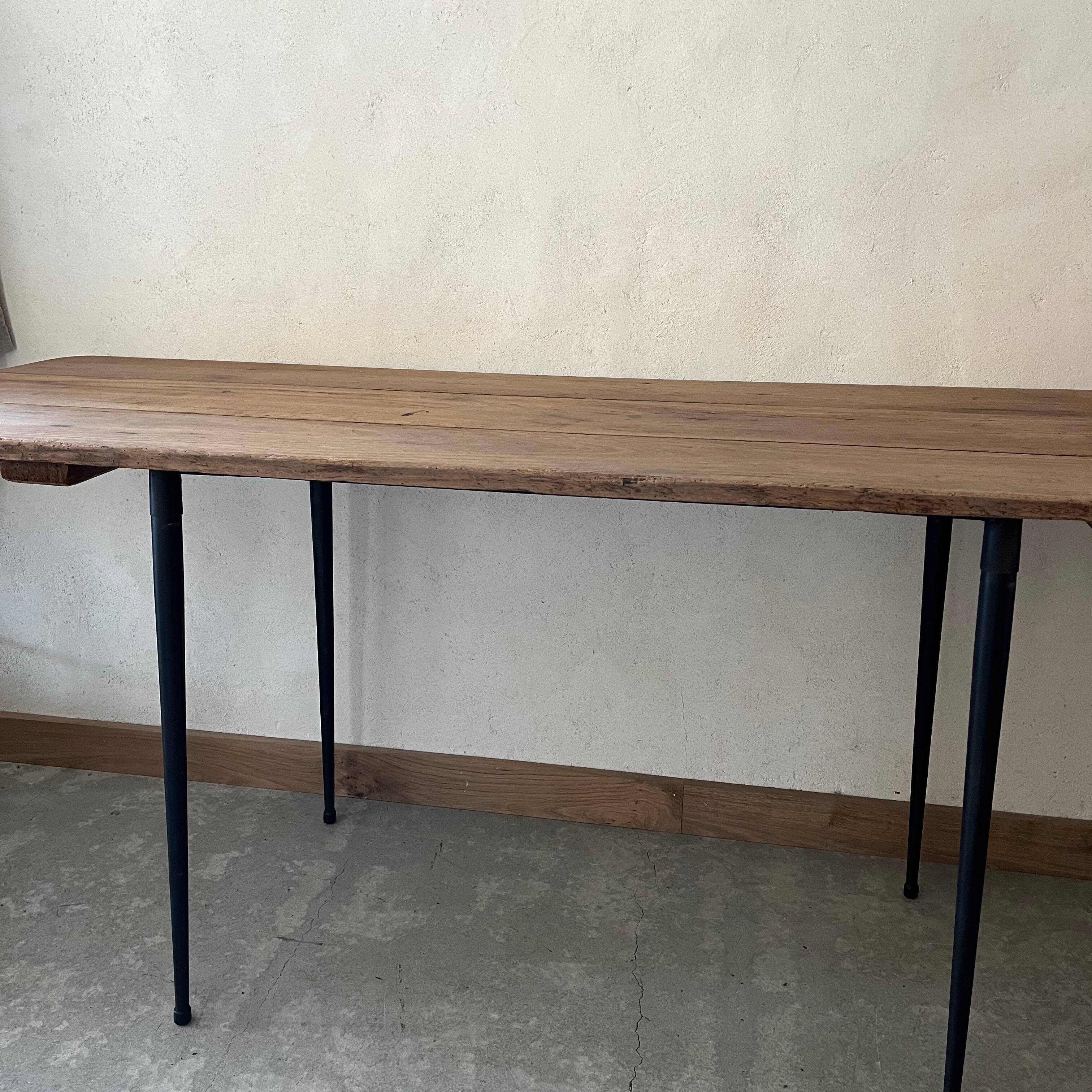 Wooden table, black metal legs