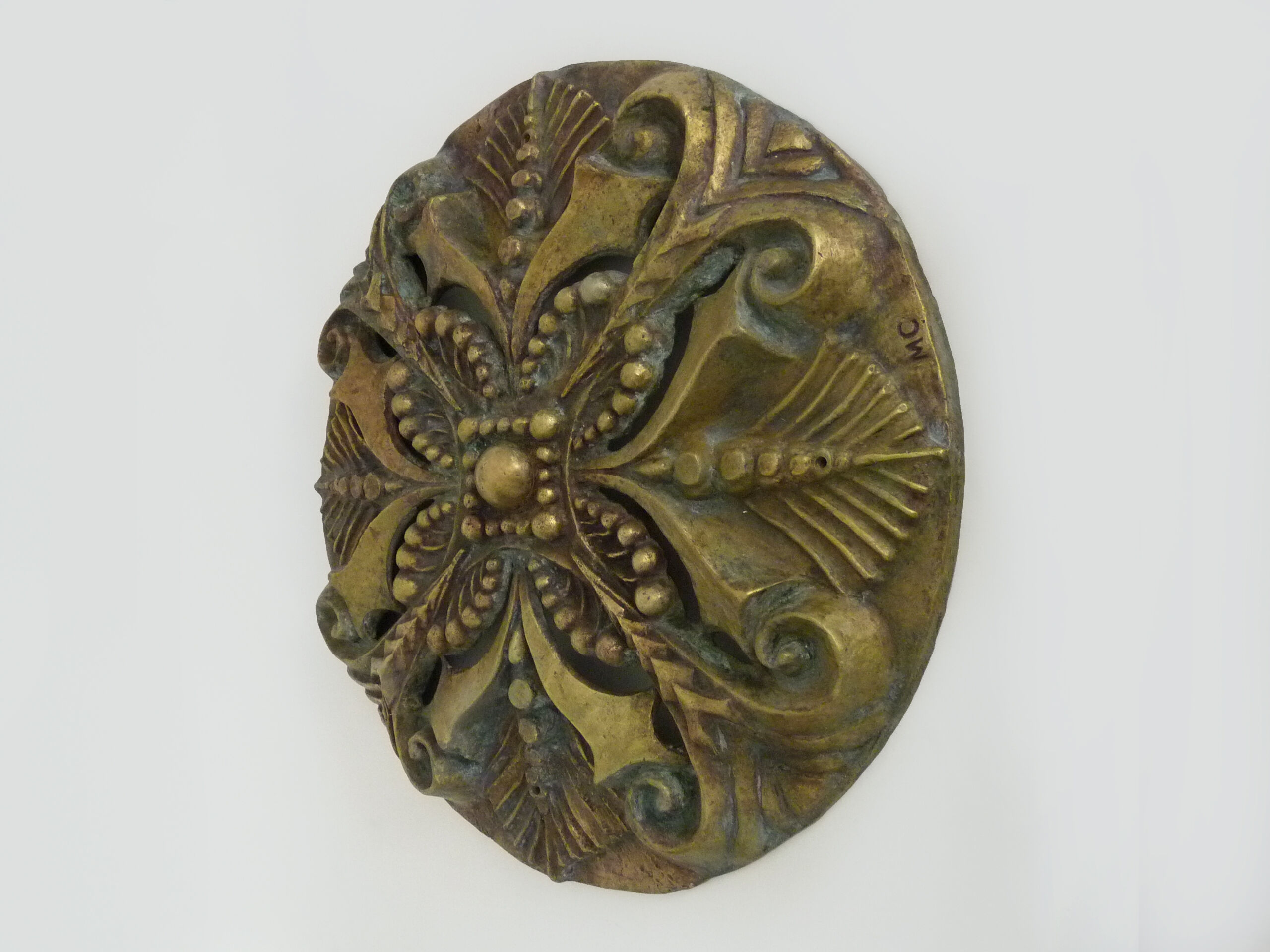 Openwork bronze wall lamp signed MC, 50s