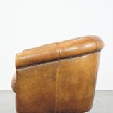 Fauteuil club en cuir de mouton patiné couleur cognac